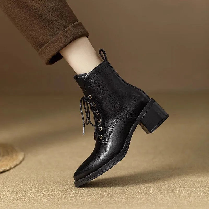 Women's black pointed-toe ankle boots with 5.5cm heel and 13cm shaft