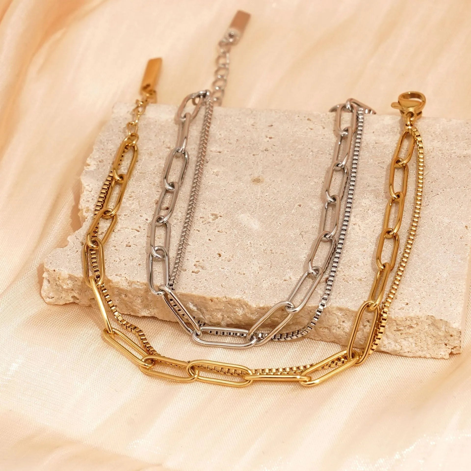 Women's double layer twin titanium steel bracelet with geometric line design in gold or silver