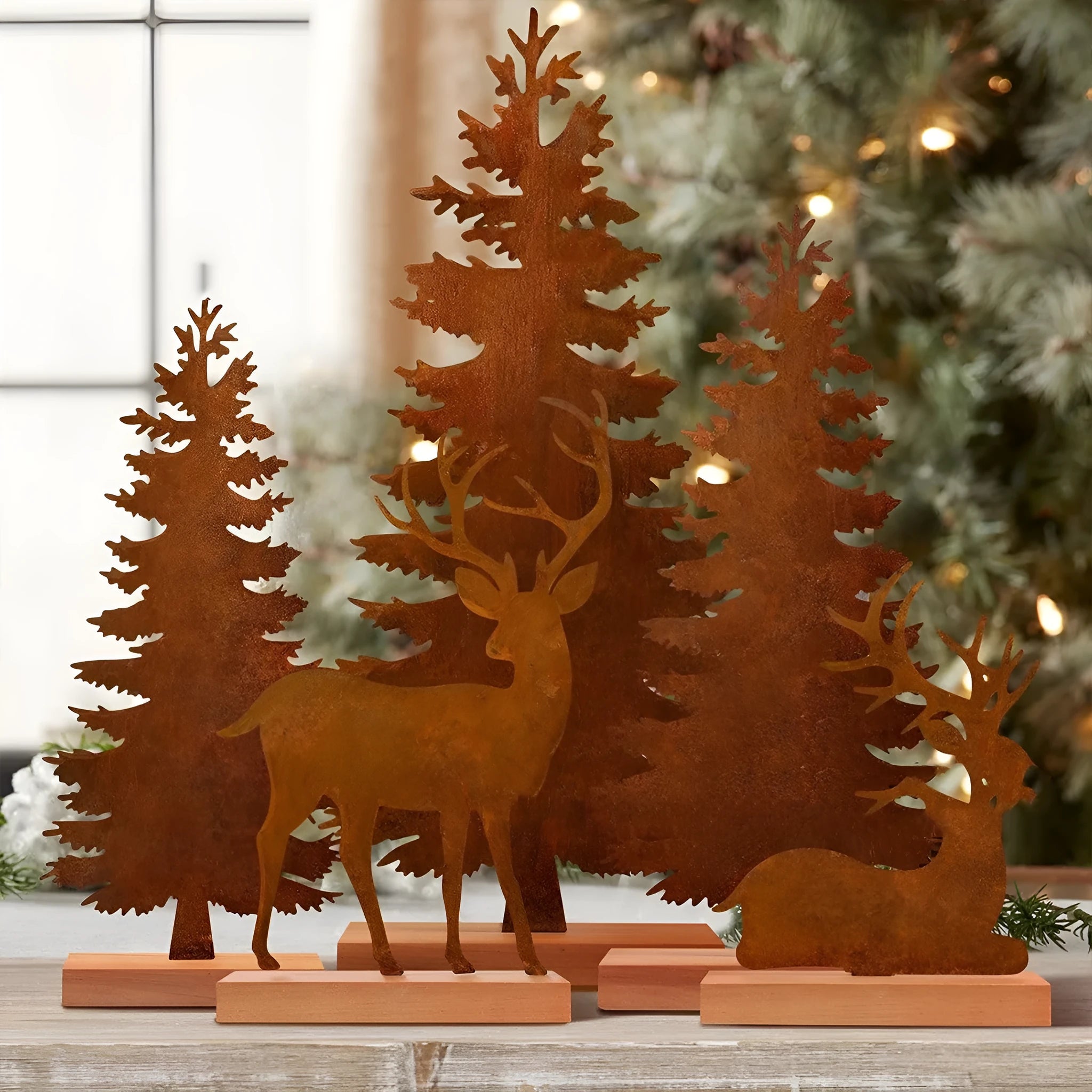 Set of three metal rustic elk Christmas tree decorations in vintage American style.