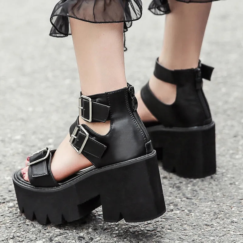 Black women's chunky heel sandals with back zipper, thick sole, buckle detail and round toe in punk Harajuku style.