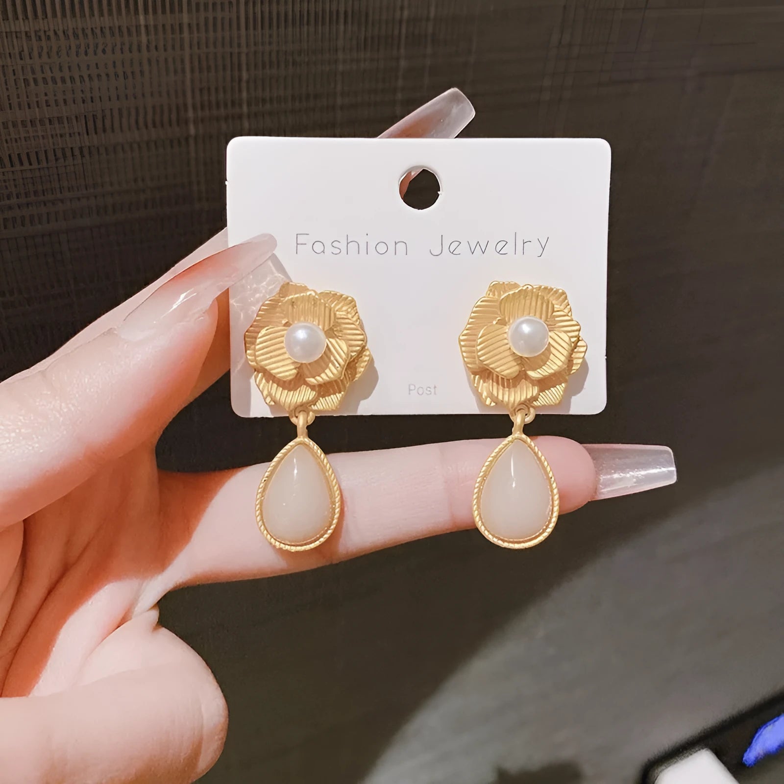 Gold electroplated alloy stud earrings with opal stone and Hong Kong style floral design featuring needle rose pearl and ice flower elements
