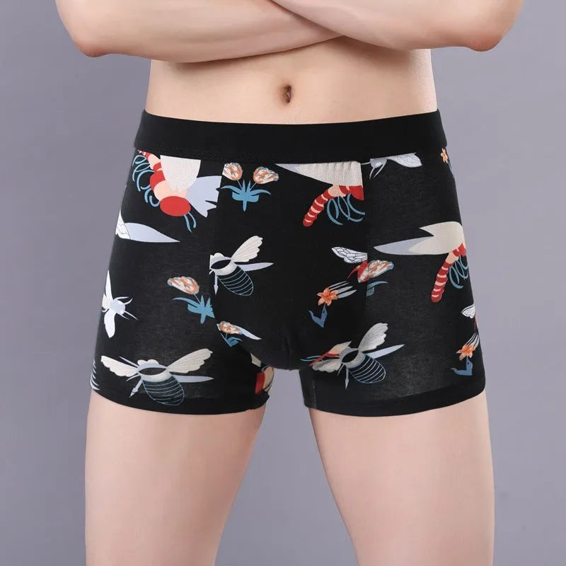 Men's cotton boxer briefs on a white background, showing the U-shaped pouch design and a floral pattern.