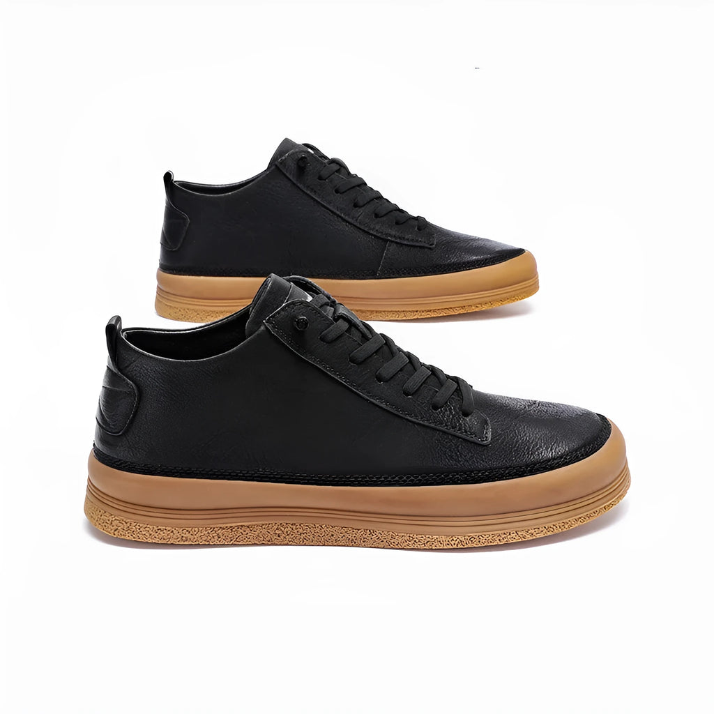 A pair of men's black leather casual shoes with a lace-up front and round toe on a white background.