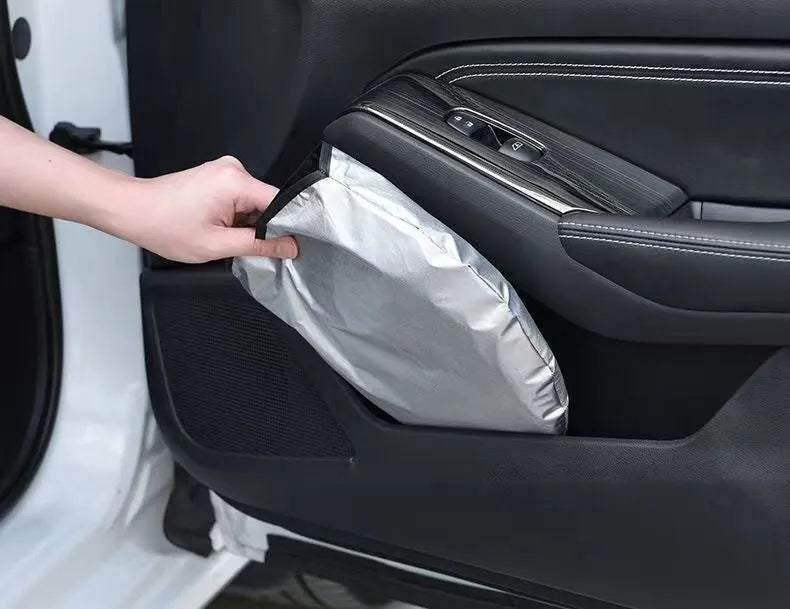 Aluminium foil car sunshade showing reflective silver surface with size dimensions displayed