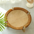 Brown rattan woven elevated pet bed measuring 46cm square with 17.5cm height