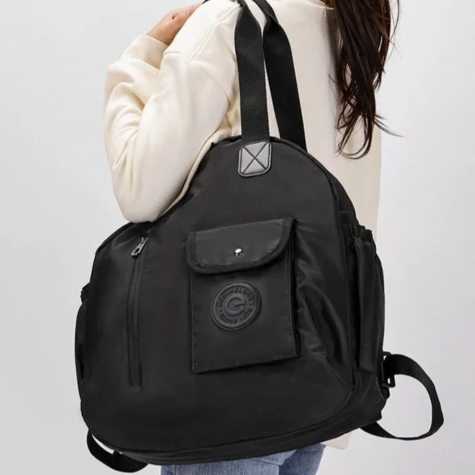 Outdoor backpack showing 48cm height dimensions with nylon material and organisational pockets