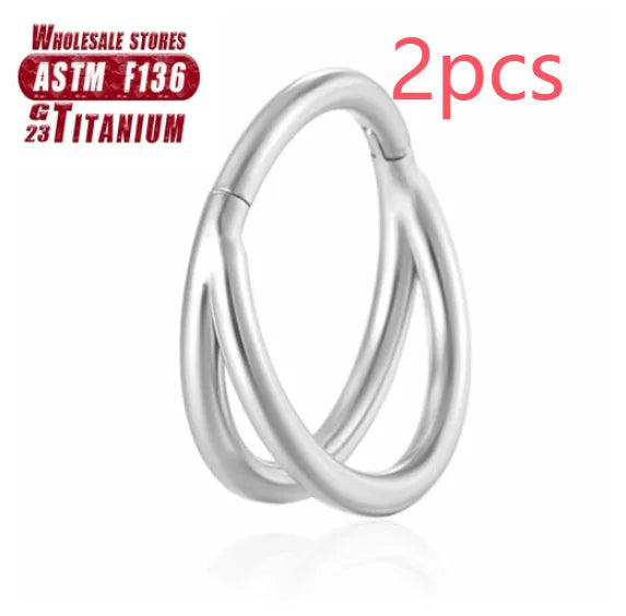 Titanium alloy fork nose ring in silver colour on a plain background, showing its shape and size.