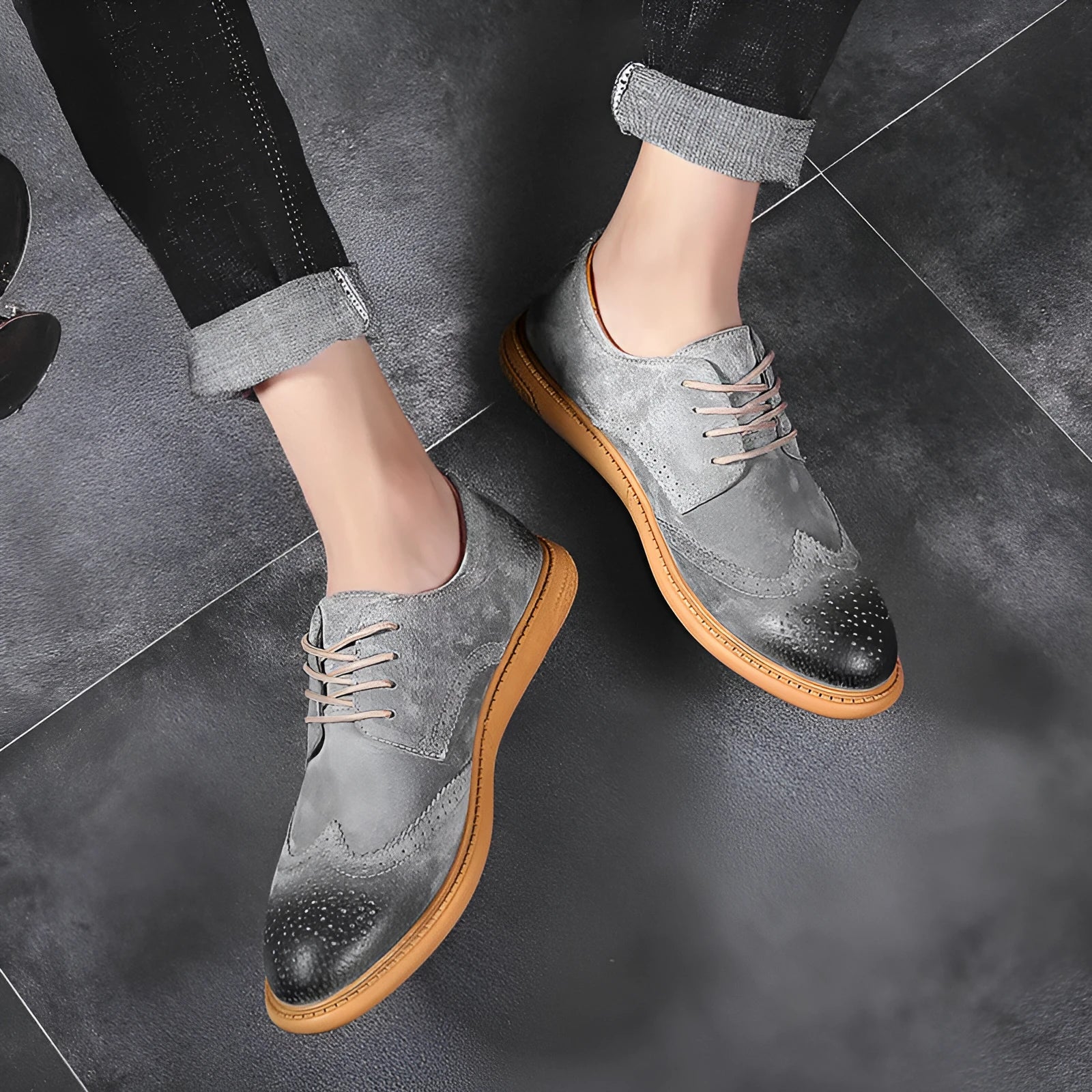 Men's black genuine cowhide leather lace-up business shoes with rubber sole on a grey background.