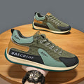 Men's grey and green mesh running shoes with round toe and lace-up design shown from side view
