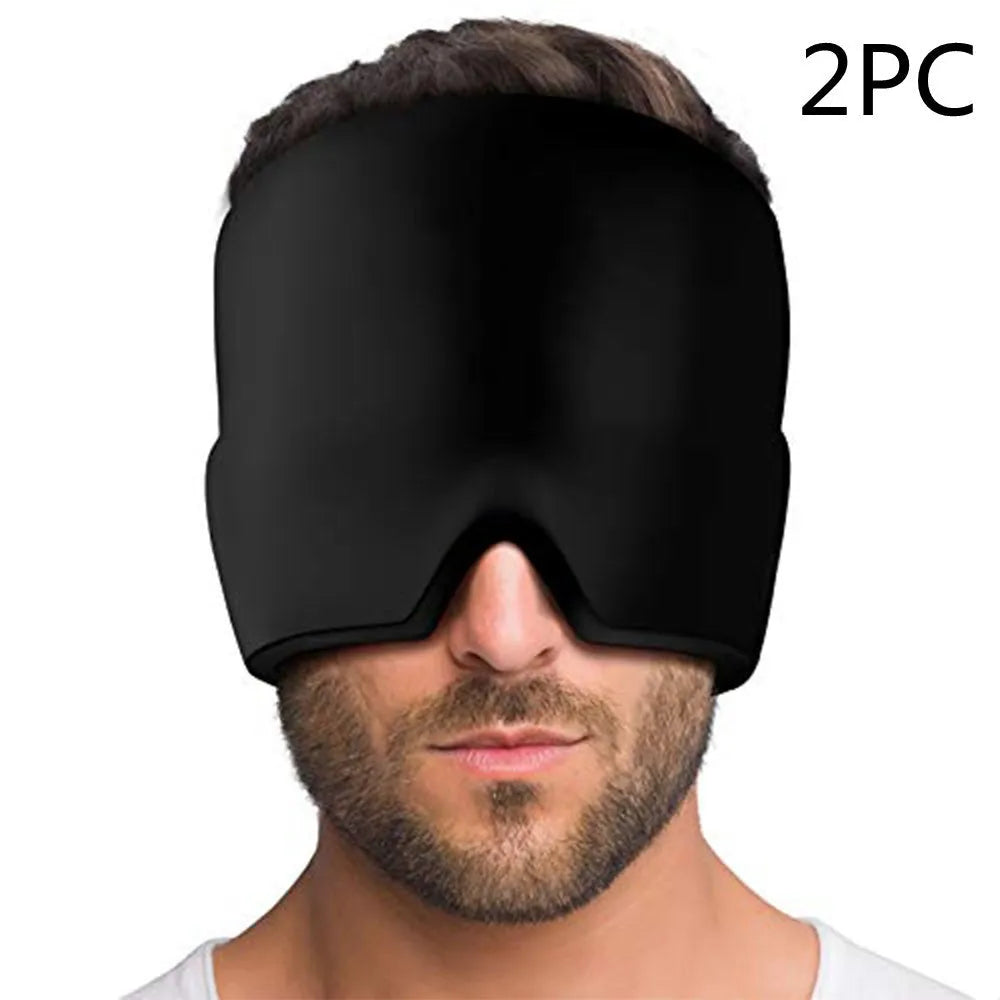 Black elastic cloth gel cold therapy eye mask for headache relief on grey background.