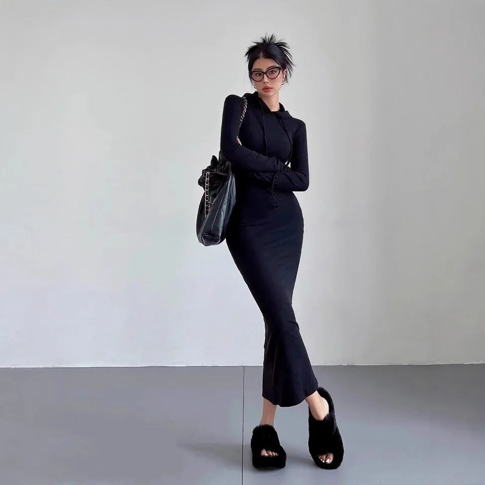 Women's grey hooded long sleeve sheath dress with high waist on a mannequin.