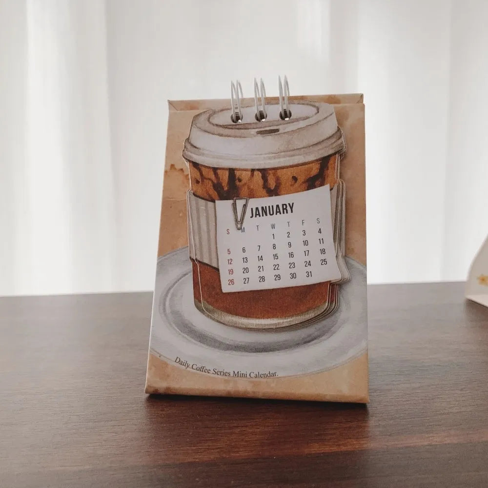 Mini coffee-themed desk calendar for 2025 showing daily pages and simple modern design