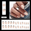 Black and white frosted press-on false nails with French manicure style and plastic wearable armour