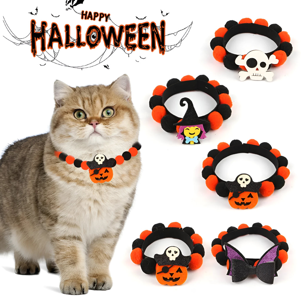 Halloween dog collar with a large orange pom-pom and pumpkin design on an adjustable black band.