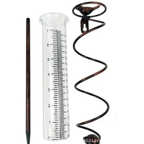 Cast iron bird garden rain gauge with glass measuring tube showing hummingbird design
