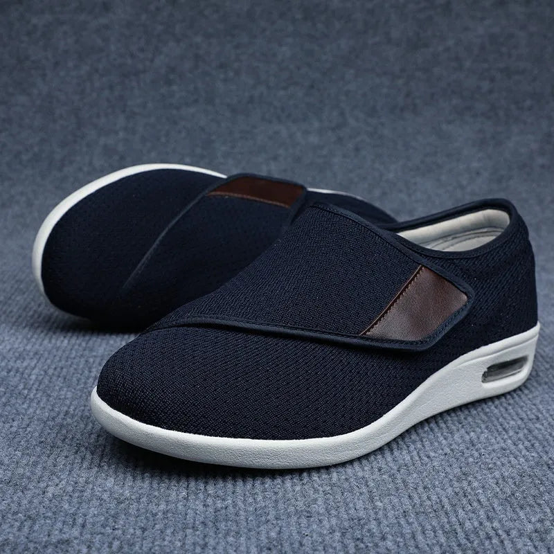 Casual beige slip-on shoes with a round toe and rubber sole for men and women.
