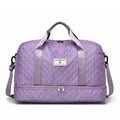 Large Oxford cloth travel bag with 36-55 litre capacity shown in haze blue colour