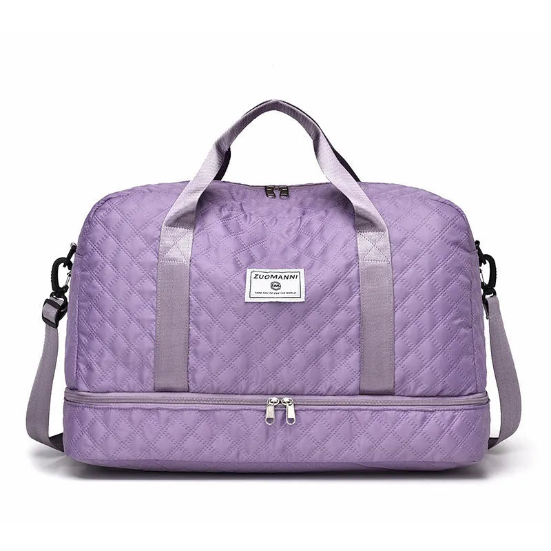 Large Oxford cloth travel bag with 36-55 litre capacity shown in haze blue colour