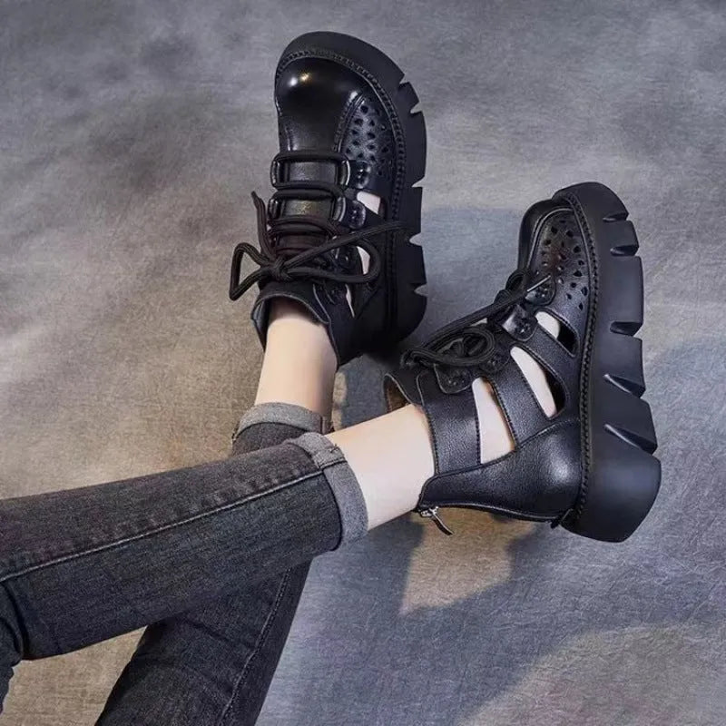 Women's black plush leather platform sandals with fish mouth toe and hollow hole design on a PU sole.