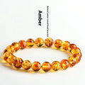 Natural yellow piebald amber geometric bracelet with polished beads