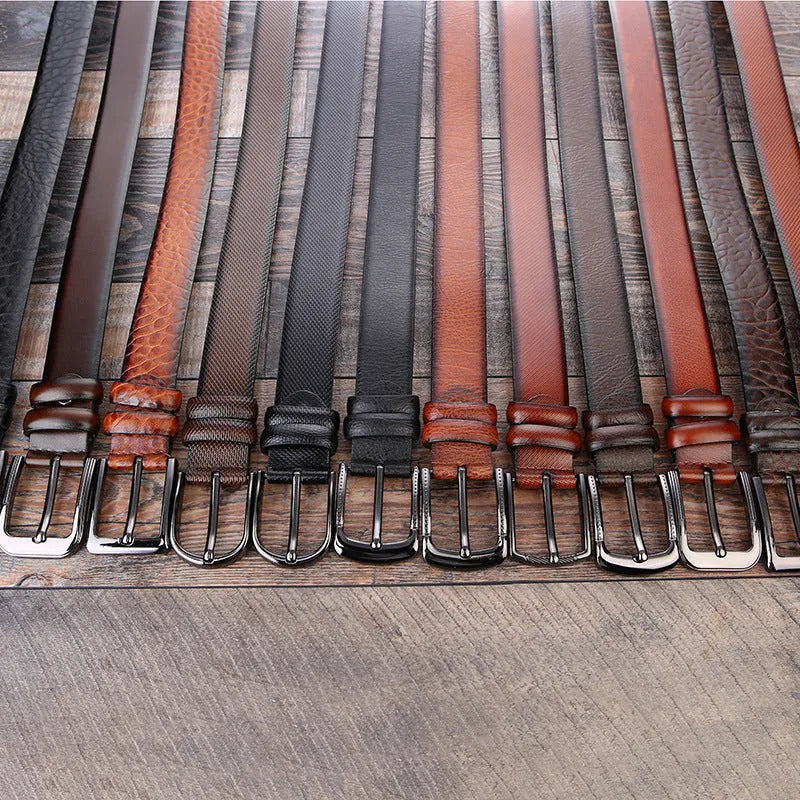 Men's business belt showing laser pattern detail with alloy pin buckle on imitation leather strap