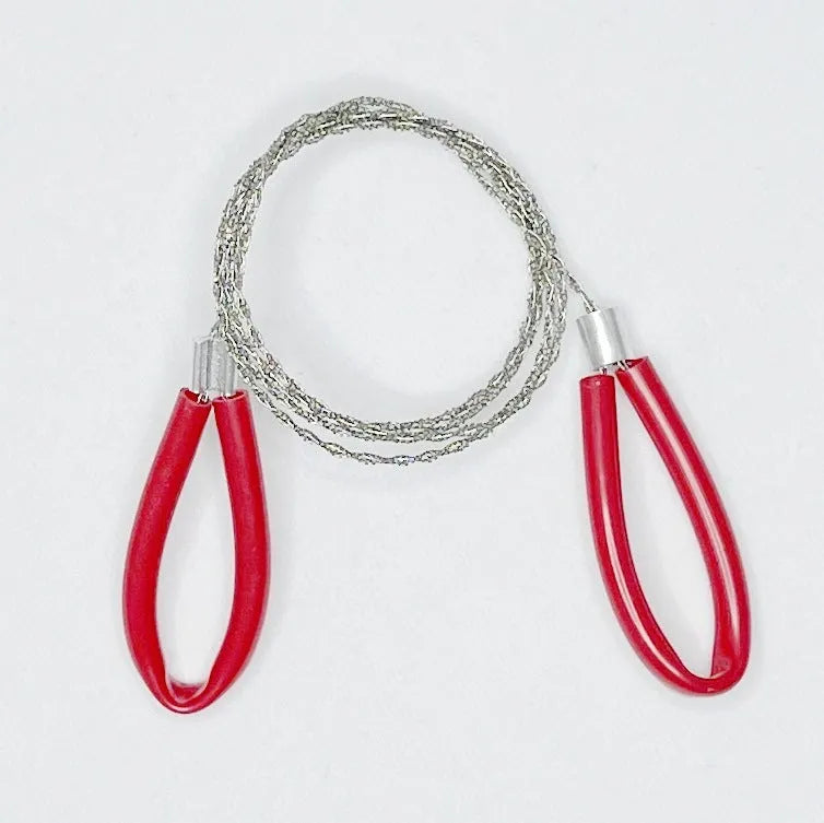 Survival wire saw with leather hand case showing steel wire construction and compact design