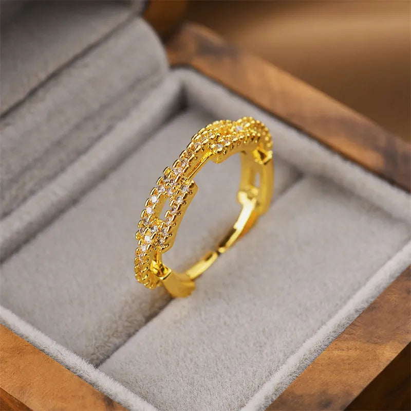 Gold geometric open adjustable women's ring showing Korean fashion design with electroplated finish