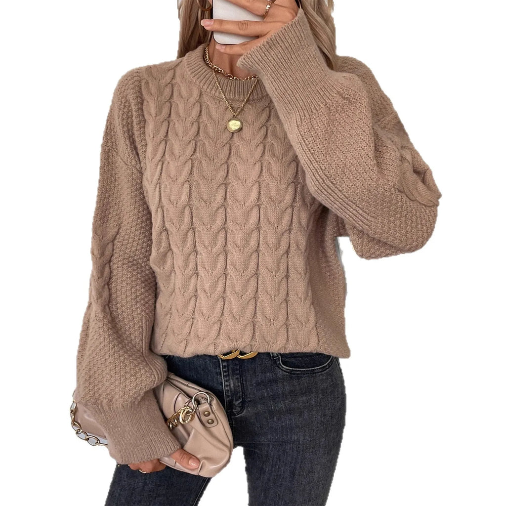 Women's khaki loose pullover sweater with round neck and twist detail on solid colour fabric