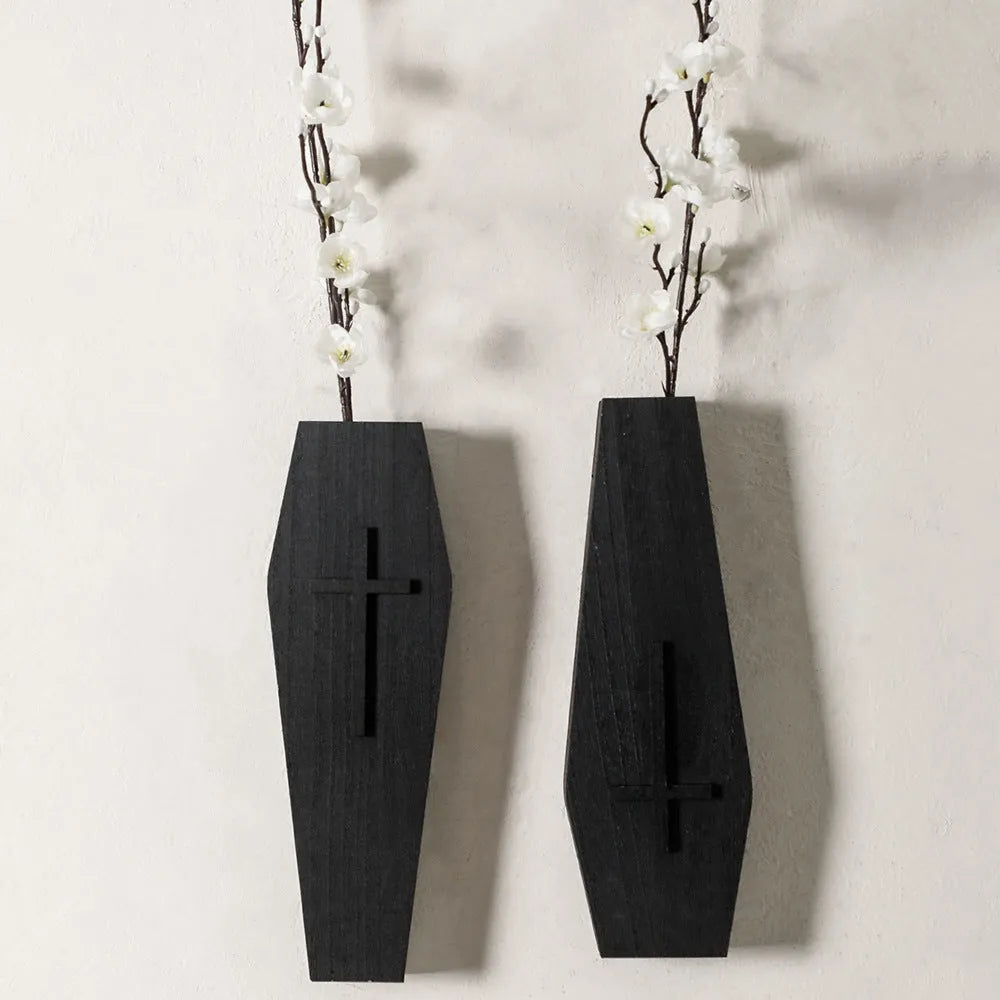 Black wooden cross-shaped wall shelf decoration measuring 27cm by 9cm