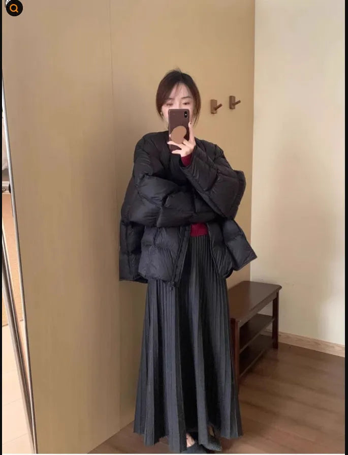 Women's dark grey knitted two-piece suit with artistic collage stitching and retro ethnic style.