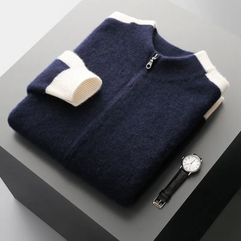 Man wearing a dark blue half turtleneck zipper cardigan made of thick rough wool yarn.