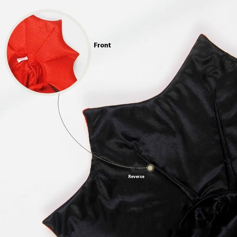 Black and red polyester Halloween costume for a cat or dog on a hanger.