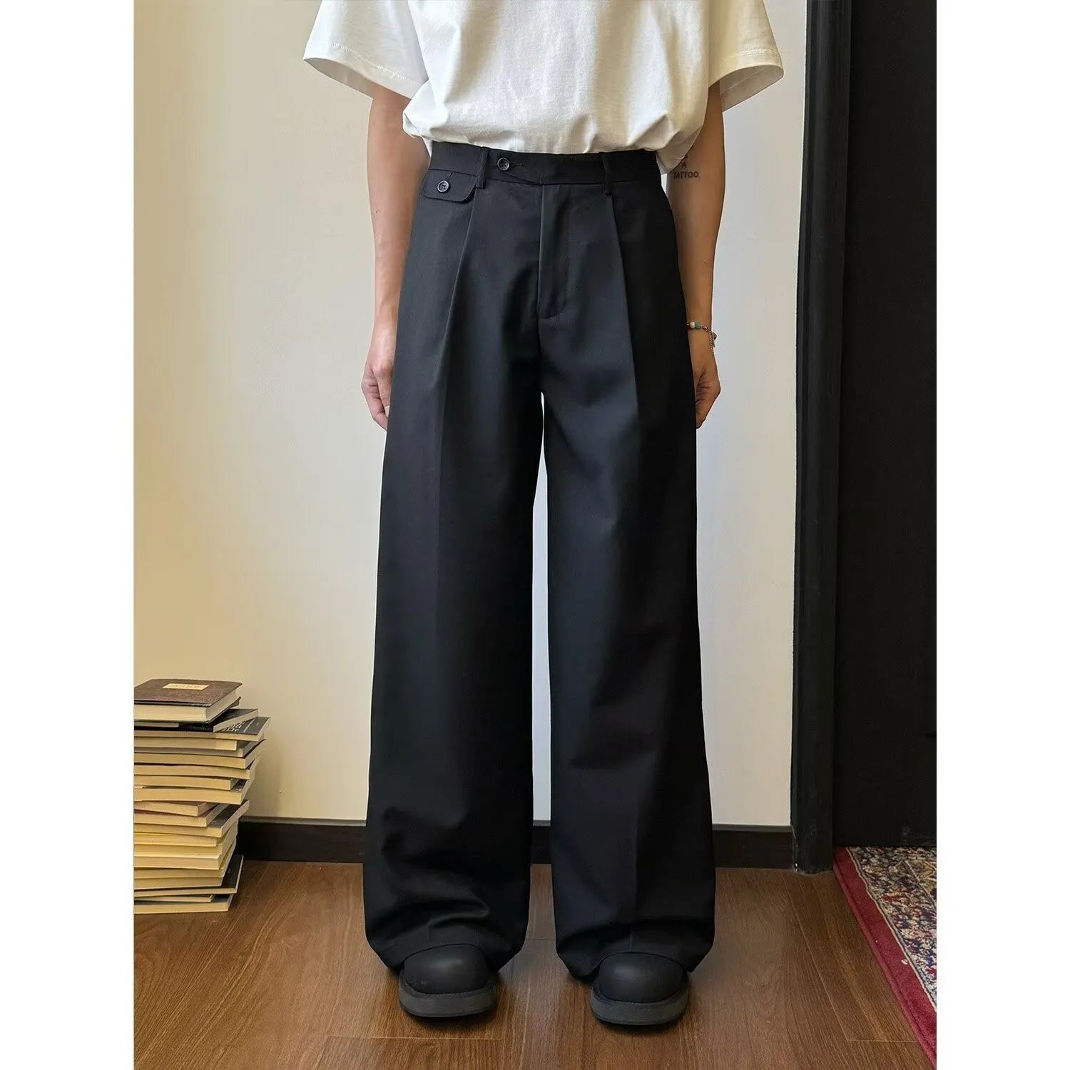 Men's brown straight-cut wide-leg casual suit trousers laid flat