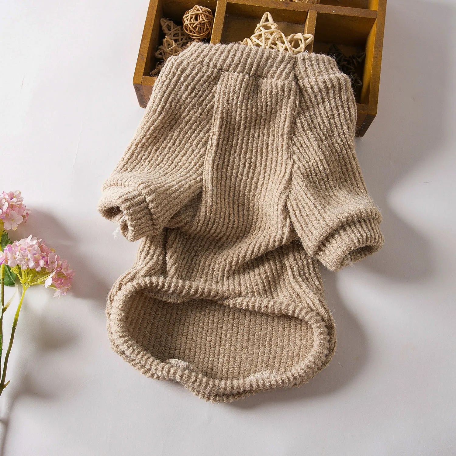 Brown cloth dog sweater pullover on a small dog, showing casual style.