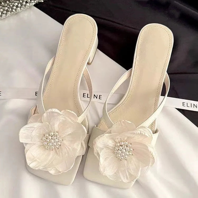 Women's chunky heel square toe sandals with satin upper and flower detail in cream-white