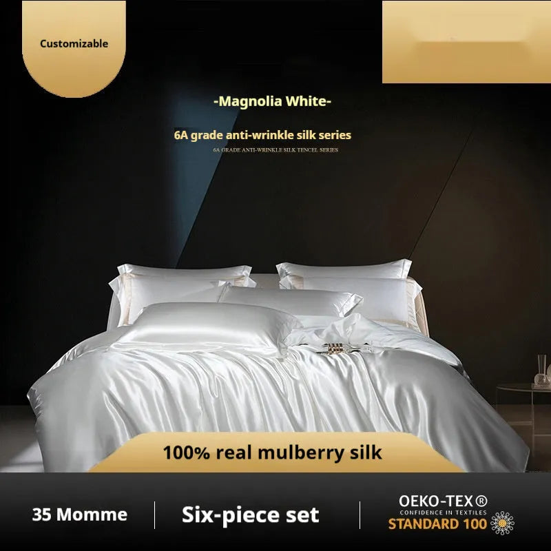 Solid colour silk four-piece quilt cover set shown in champagne gold colour