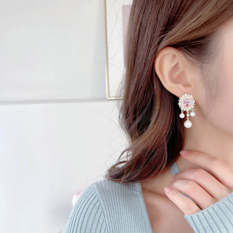 Oval geometric pearl tassel earrings with zircon stones in light purple colour