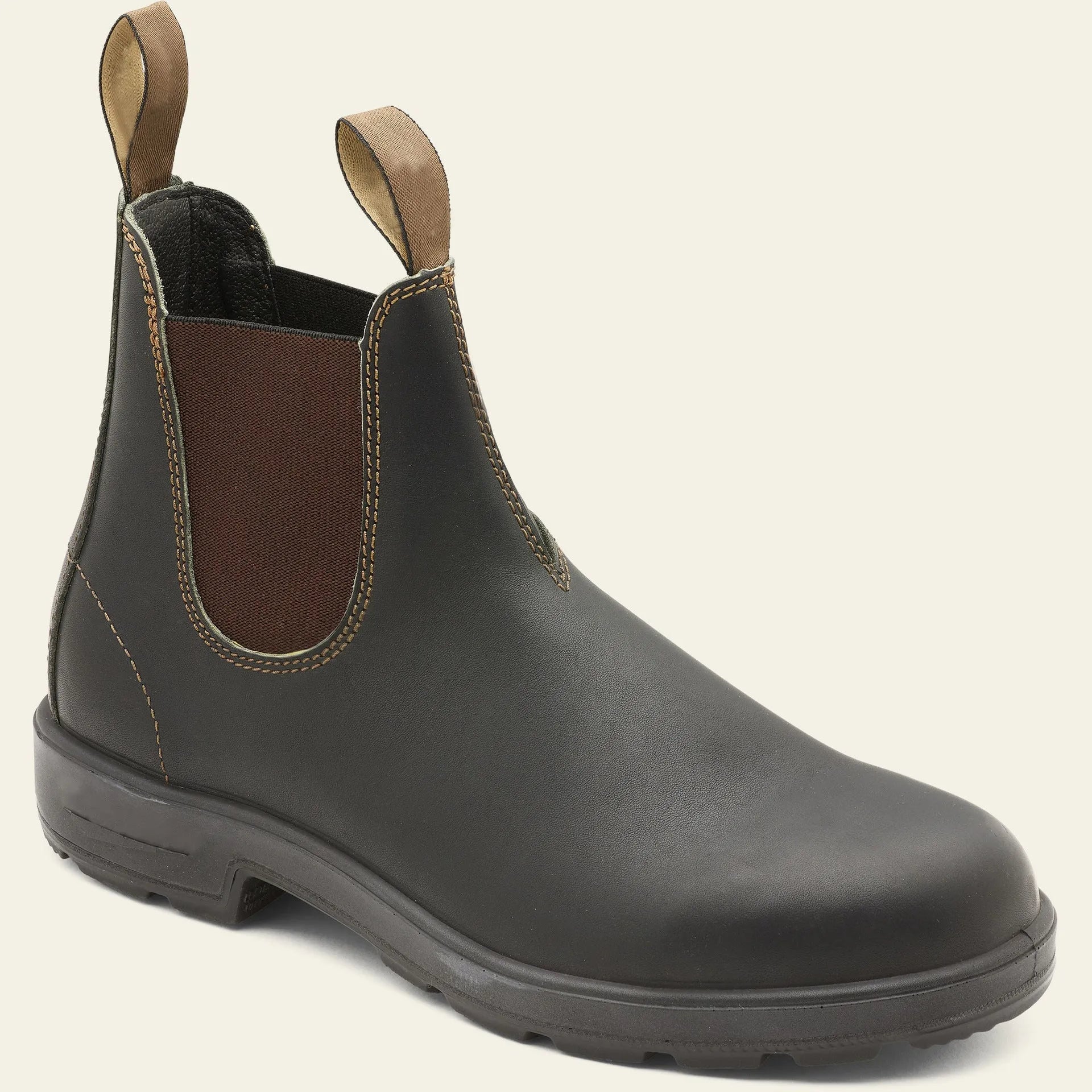 Unisex vintage brown Chelsea boots with a chunky sole and round toe on a white background
