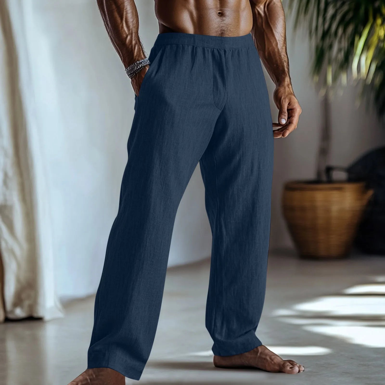 Straight-leg cotton linen trousers in light green shown front and back view