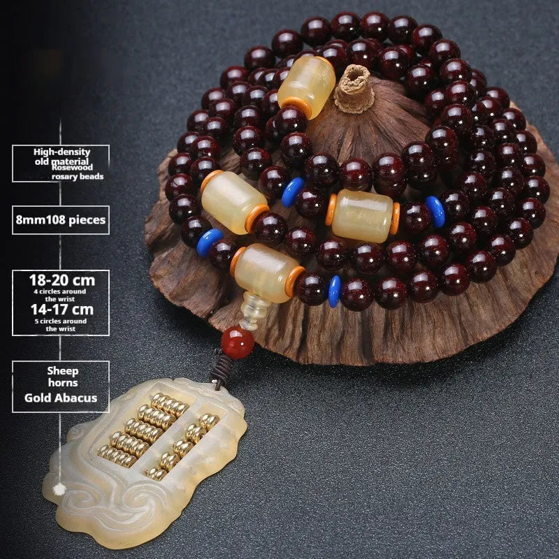 Men's rosewood 108 bead mala bracelet with a turquoise gemstone decorative centrepiece.