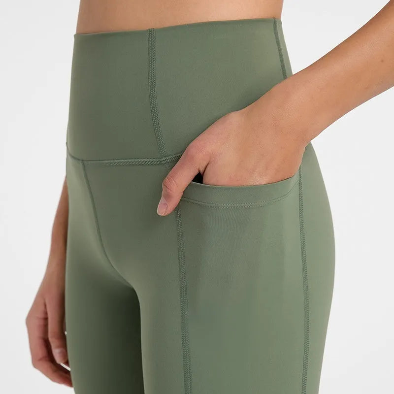 Women's tight-fitting mid-length sport shorts in black cotton blend fabric.
