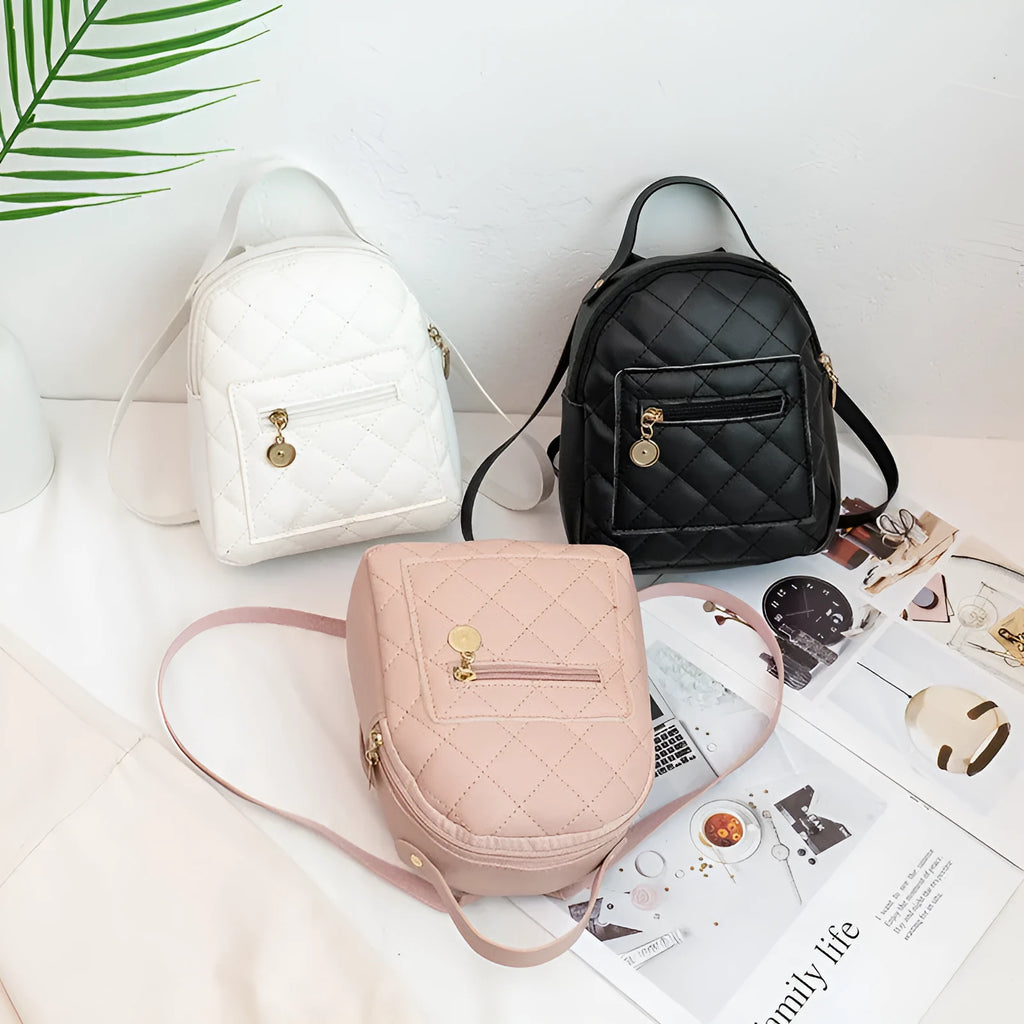 Girls' Korean style embroidered backpack in hard PU material showing vertical square shape and sandwich pocket