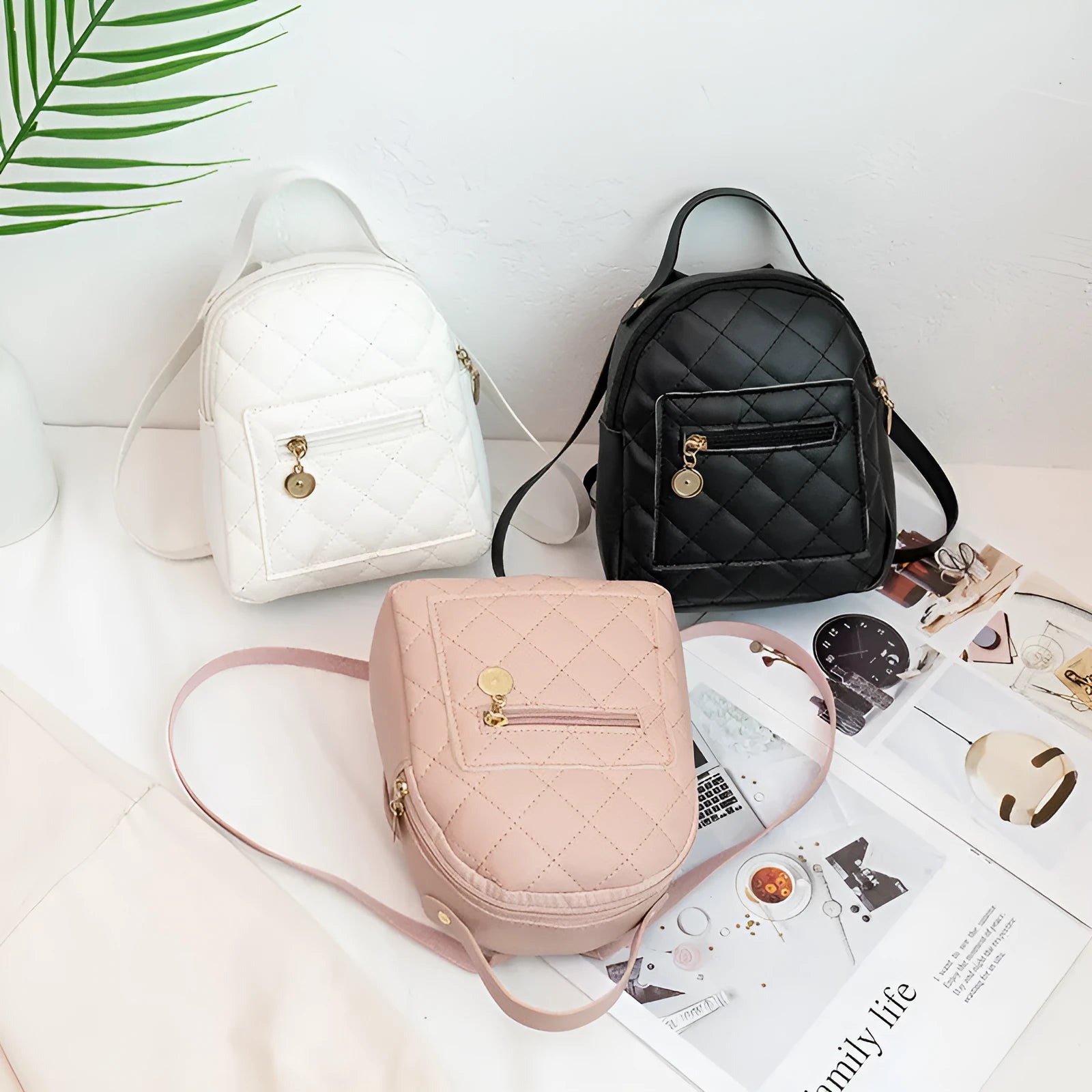 Girls' Korean style embroidered backpack in hard PU material showing vertical square shape and sandwich pocket
