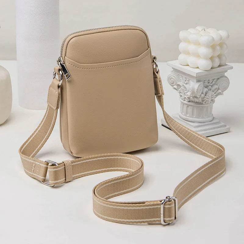 Solid colour women's crossbody phone bag in black, beige, khaki, or green.