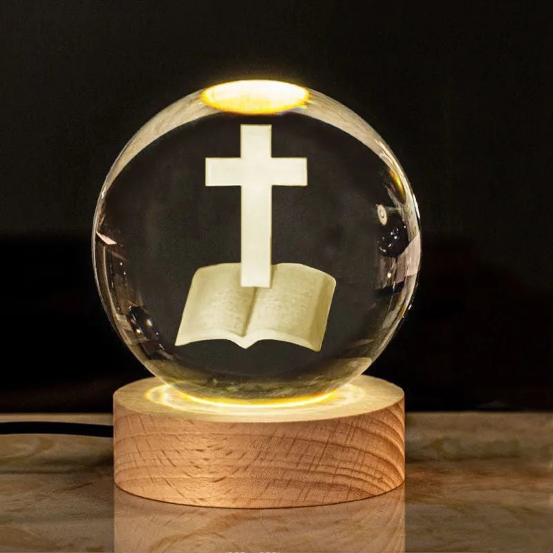 White crystal lamp with 6cm diameter orb on solid wood warm light base showing religious ornamentation