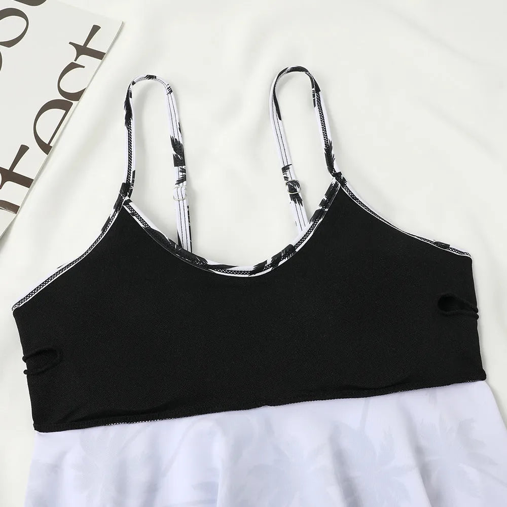 Women's black high-waist two-piece swimsuit with coconut tree print option, shown as a top and briefs set.