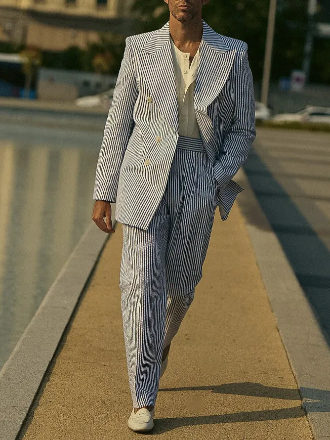 Women's blue and white striped polyester suit set with blazer, trousers and shirt