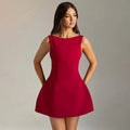 Backless slim-fitting sleeveless summer dress in polyester fabric on a hanger