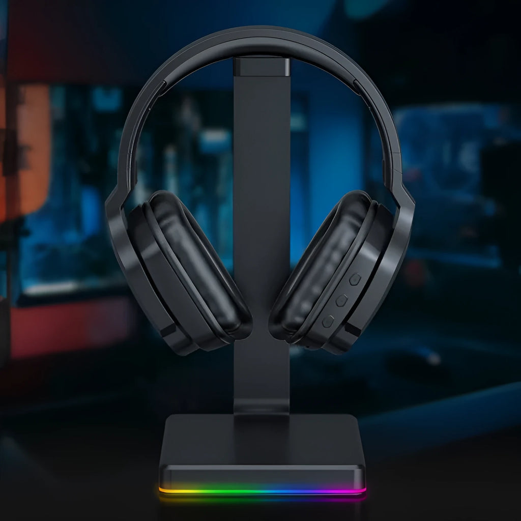 Luminous black wireless gaming headphones with over-ear design showing head-mounted construction