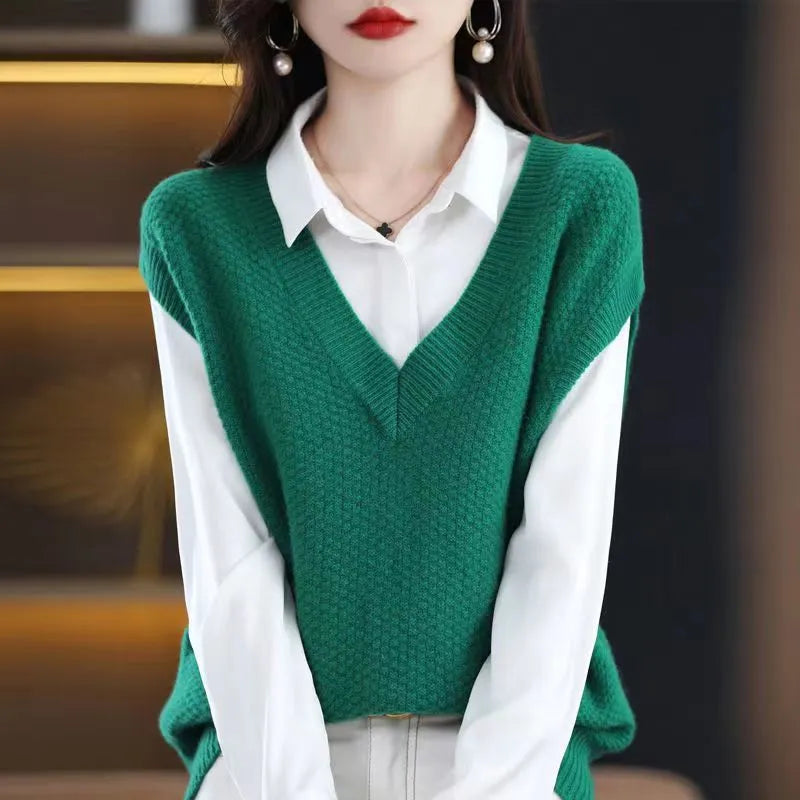 Cashmere acrylic knitted sleeveless V-neck vest with a raised 3D pattern, shown in creamy-white colour.
